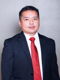 Headshot of Moua Xiong the Secretary of WHA.
